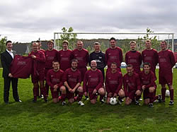 Blackburn FC - Brian Sutton, Partner, presenting strips to the players